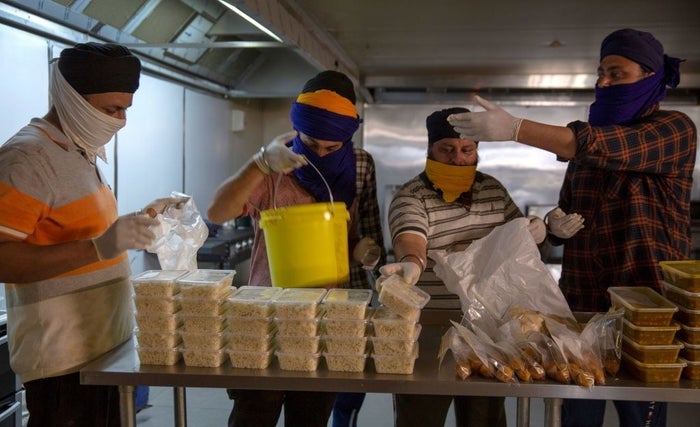 Sikh Volunteers Australia preparing food deliveries