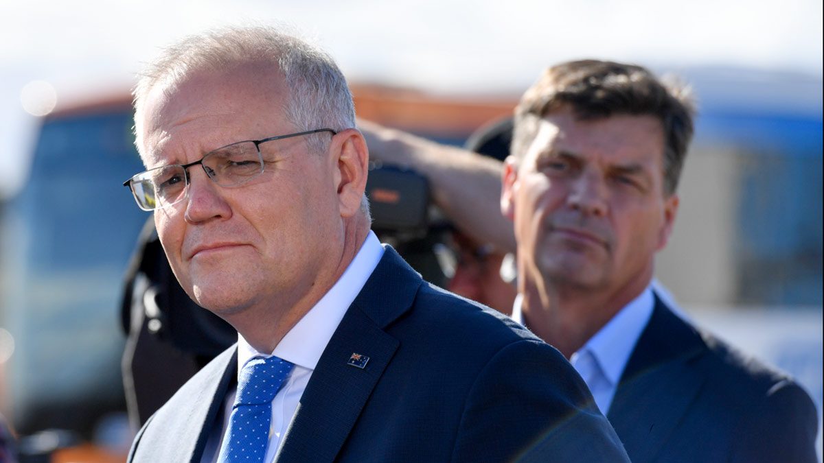 Prime Minister Scott Morrison and Minister for Energy Angus Taylor at a press conference during a visit to Geelong Oil Refinery. (AAP Image/Mick Tsikas)