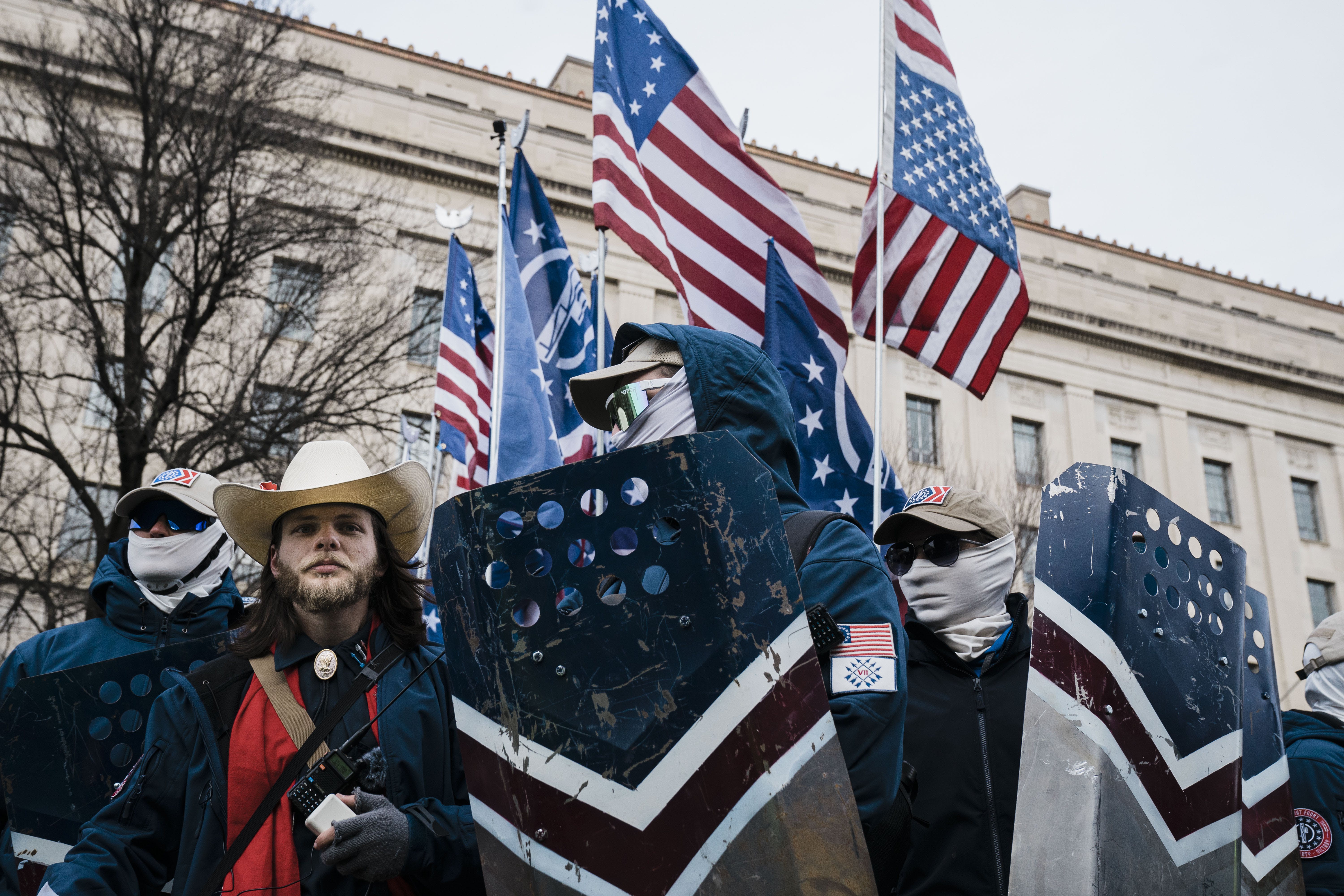 WASHINGTON, DC - JANUARY 21: Members of the right-wing group, the Patriot Front, and their founder, Thomas Ryan Rousseau, second from left, prepare to march with anti-abortion activists during the 49th annual March for Life along Constitution Ave. on Friday, Jan. 21, 2022 in Washington, DC.  (Kent Nishimura / Los Angeles Times via Getty Images)