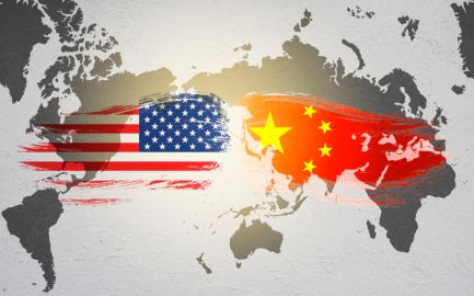 USA and China flag on flipped world map.