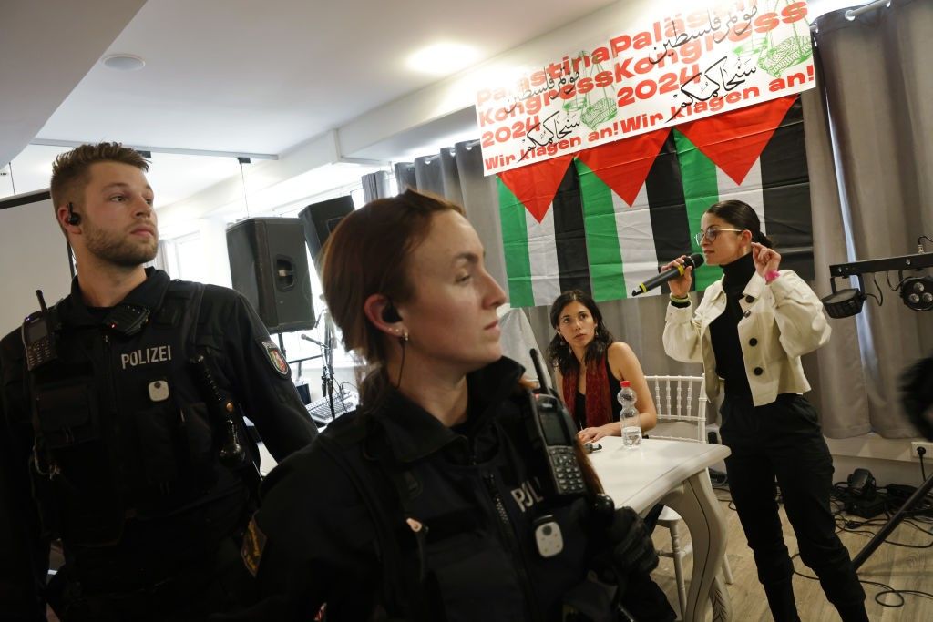 Berlin police break up the Palestine Congress as a woman speaks