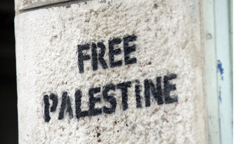 Free Palestine graffiti on a wall